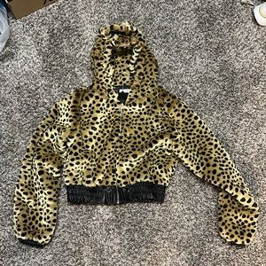 Adika cropped leopard fur jacket.